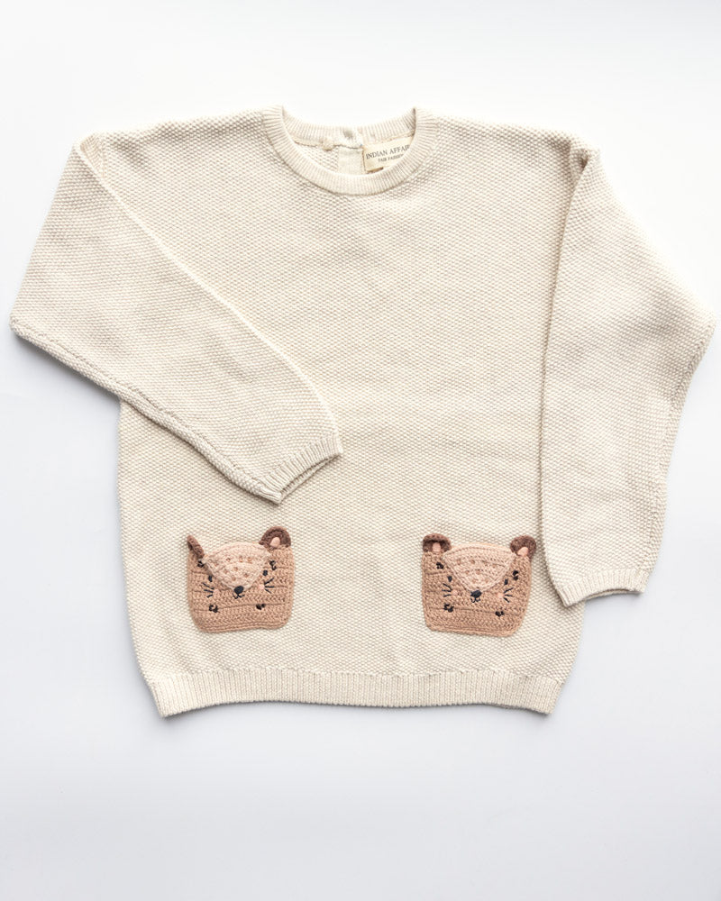 Mädchen Pullover beige aufgesetzte Taschen