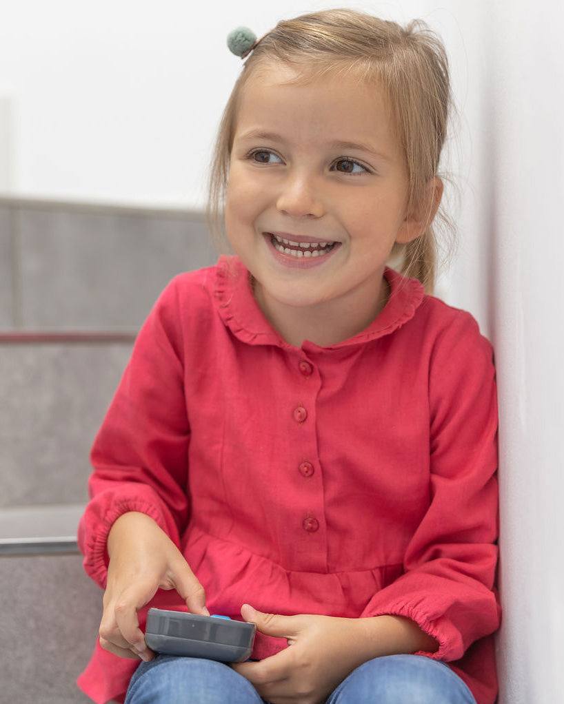 Mädchenbluse koralle Rüschenkragen